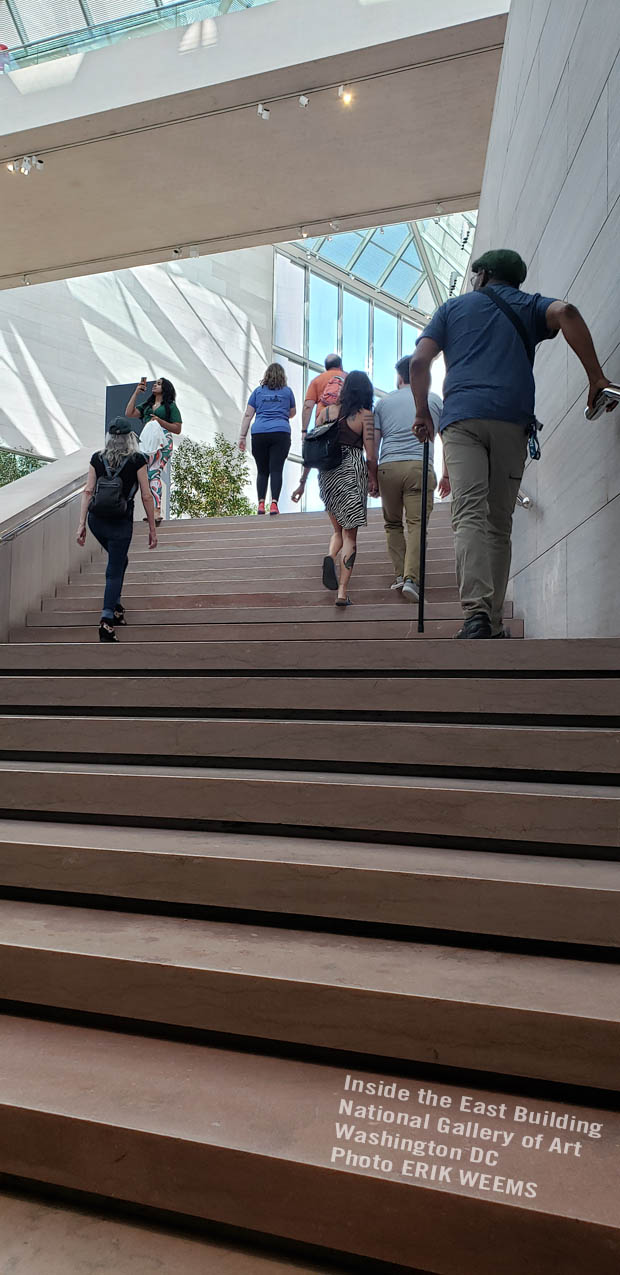 Walking the steps into the East Building of the National Gallery of Art Washington DC