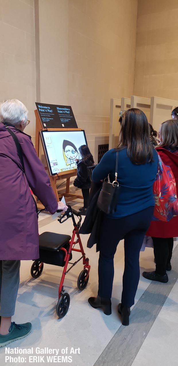 Photo of children drawing on digital tablet at the National Gallery of Art in Washington DC